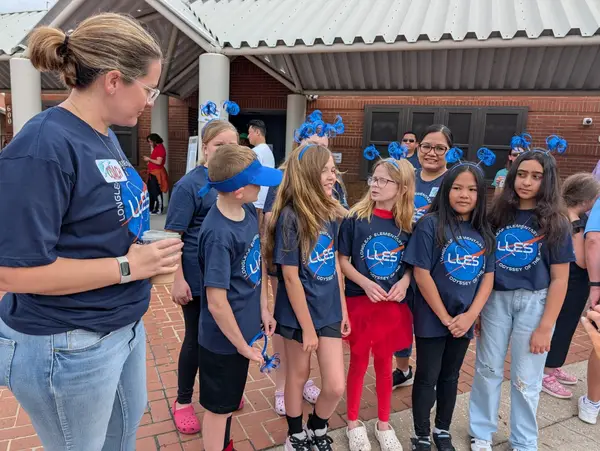 Team lined up at school